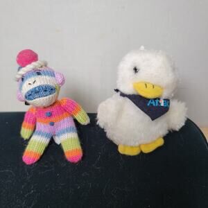 Set of 2 Random Mini Clips: Sock Monkey & Aflac Talking Duck